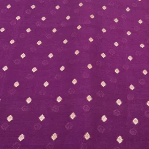 Rich woven golden motifs (butis) over a purple base fabric, likely jacquard or handloom weave